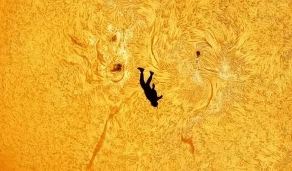 Уникальная астрофотография: парашютист на фоне Солнца